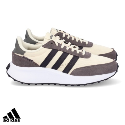 Sapatilhas Adidas bege com riscas pretas e sola branca