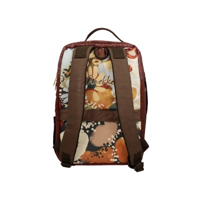 Mochila colorida com alças castanhas e padrão abstrato