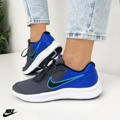 Ténis desportivos Nike cinzento e azul com sola branca