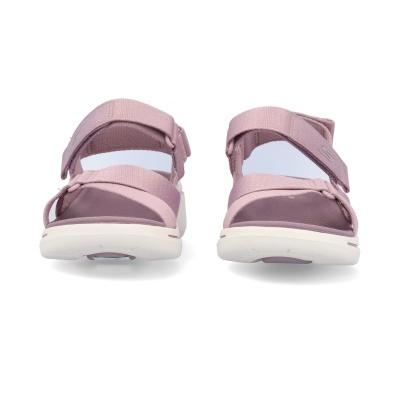 Sandálias cor-de-rosa com tiras ajustáveis e sola branca sobre fundo branco