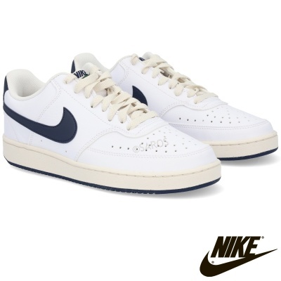 Ténis Nike brancos com logótipo azul escuro e sola creme