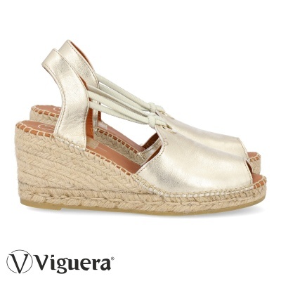 Sandálias espadrilles douradas com sola de palha e tiras elásticas brancas