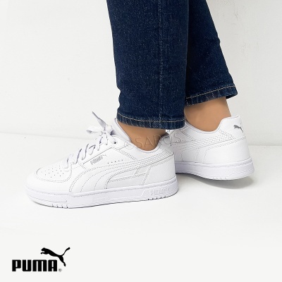 Tênis PUMA brancos em pele sintética com sola branca