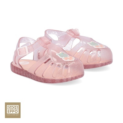 Sandálias transparentes rosa com brilho e decoração colorida