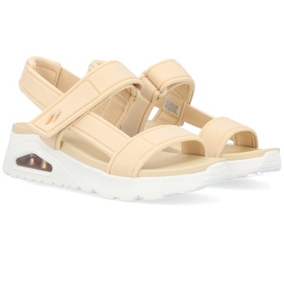 Sandálias desportivas de mulher bege claro com sola branca e tiras ajustáveis.