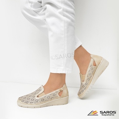 Sapatos femininos bege com padrão floral a laser e sola beige