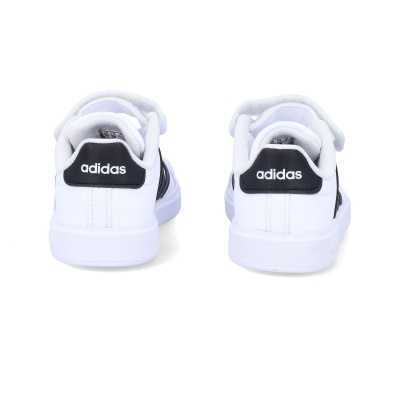 Sapatilhas Adidas brancas com detalhes pretos vistas de trás