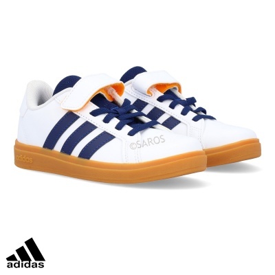 Sapatilhas Adidas brancas com riscas azuis e sola castanha