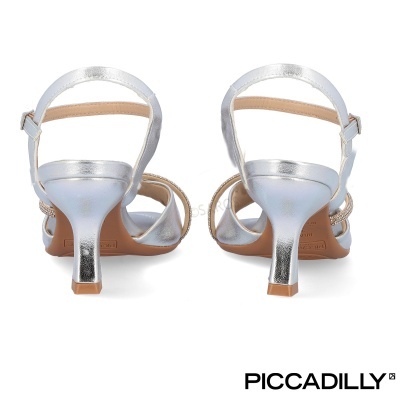 Sandálias prateadas de salto médio de costas com sola castanha