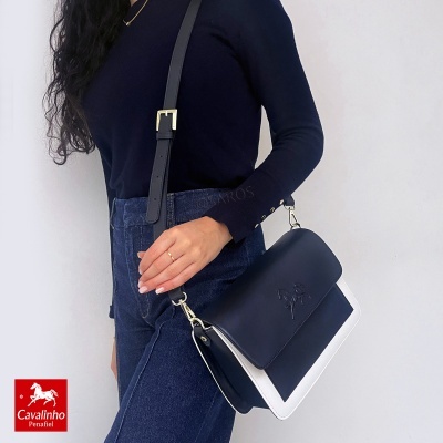 Mala transversal de senhora em pele preta e branca com alça preta