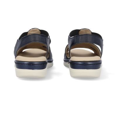 Sandálias azuis escuras de couro com sola branca vista de trás