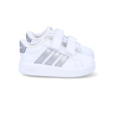 Sapatilhas brancas Adidas com riscas prateadas e fecho velcro duplo