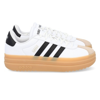 Sapatilhas Adidas brancas com riscas pretas e sola espessa castanho claro