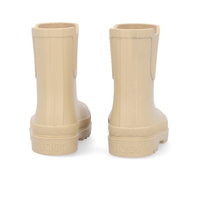 Botas de borracha bege claro vista de trás com marca 'igor' na sola.