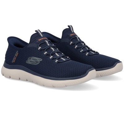 Sapatilhas Skechers slip-on azuis escuras com sola branca e detalhes em elástico.