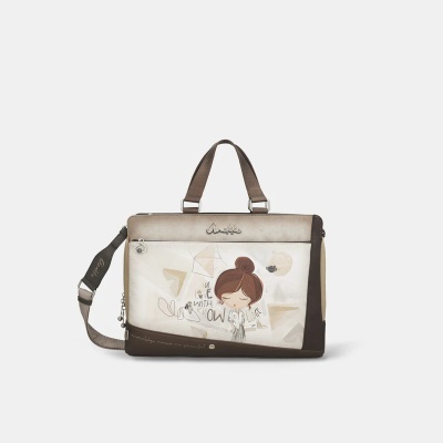Mala de mão castanha e bege com desenho de rapariga e texto Anekke
