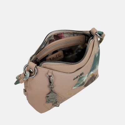 Mala de ombro bege com padrão colorido e fecho de correr aberto