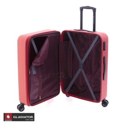 Mala de viagem vermelha aberta com interiores em roxo escuro e rodas giratórias
