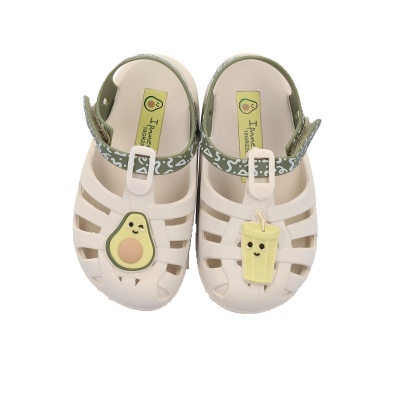 Sandálias de bebé em silicone branco com aplicações decorativas amarela de abacate e bebida