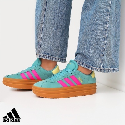Ténis Adidas azul turquesa com riscas rosa e sola castanha