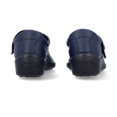 Sapatos azuis escuros vistos de trás com solado preto.