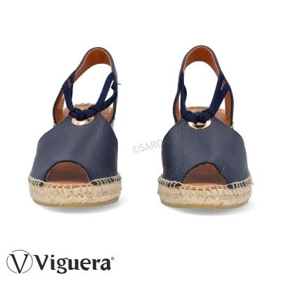 Sandálias azuis tipo espadrilles com sola de corda e amarração em tecido azul