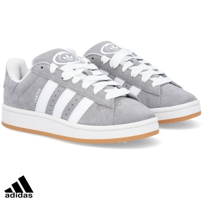 Ténis Adidas cinzentos em camurça com riscas brancas e sola castanha