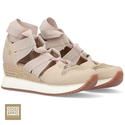 Ténis beje de senhora com tiras elásticas e sola branca e castanha