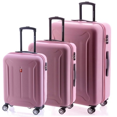 Conjunto de três malas rígidas cor de rosa com rodas e puxadores pretos