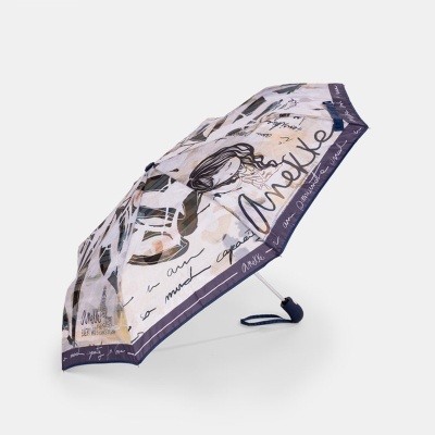Guarda-chuva dobrável com padrão artístico e desenho de mulher com texto manuscrito.
