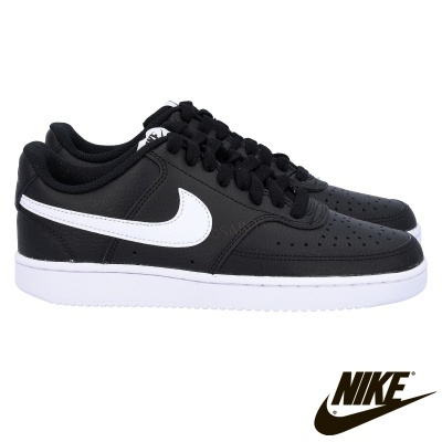 Sapatilhas pretas com sola branca da Nike e logo branco