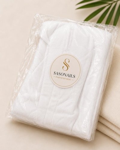 Toalhas brancas embaladas com etiqueta SASONAILS PROFESSIONAL