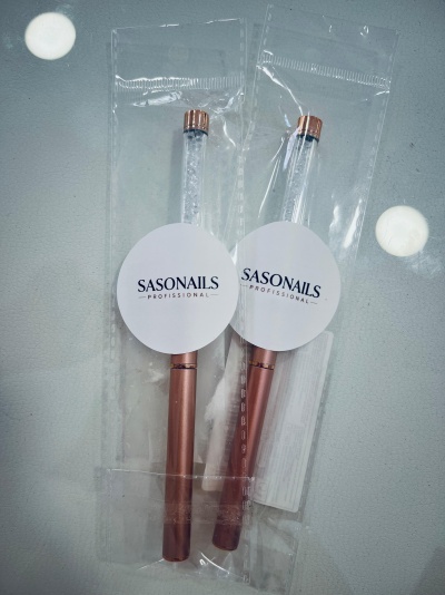 Canetas para unhas decorativas SASONAILS PROFISSIONAL embaladas em plástico transparente.
