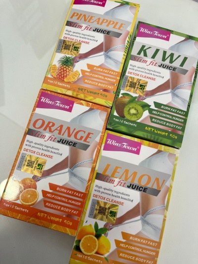 Embalagens coloridas de sucos WinsTown Slim fit Juice com imagens de ananás, kiwi, laranja e limão