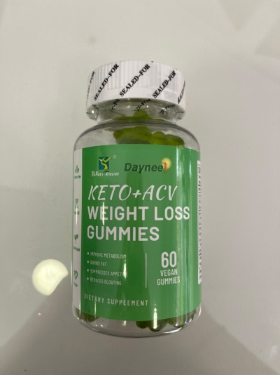 Frasco com gomas verdes para perda de peso KETO+ACV