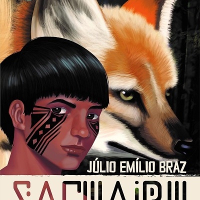 Capa do livro Saguaru com rapaz de pele vermelha e pintura facial tribal e raposa ao fundo