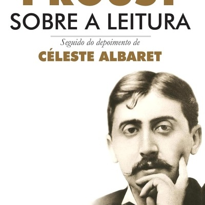 Capa de livro com texto e foto a preto e branco de um homem com bigode.