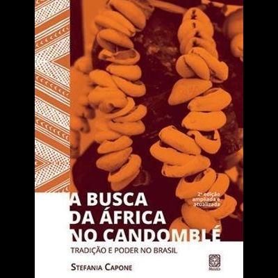 Capa do livro À Busca da África no Candomblé com colares de contas grandes laranja e padrão étnico marrom e bege.