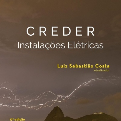 Capa de livro CRENDER Instalações Elétricas com relâmpagos sobre cidade à noite