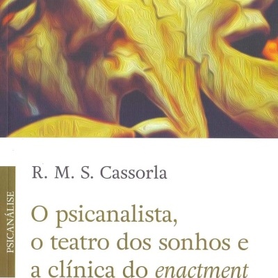 Capa do livro O psicanalista, o teatro dos sonhos e a clínica do enactment com máscaras amarelas e texto.