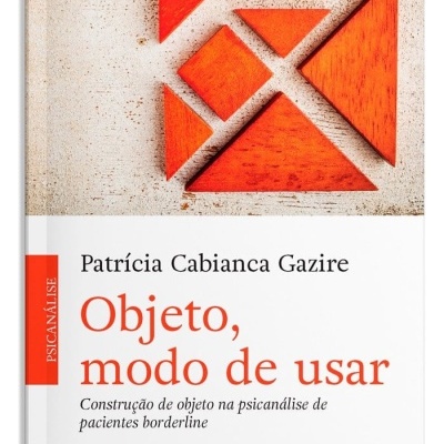 Capa de livro com peças triangulares laranja e texto em português sobre psicanálise.