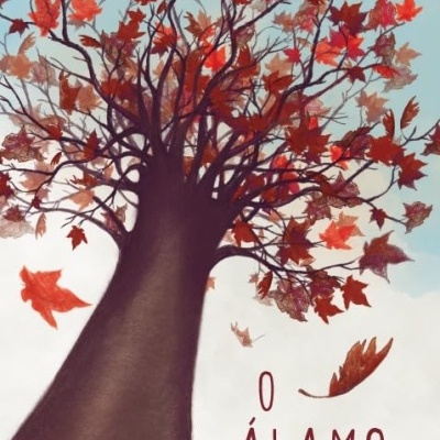 Capa de livro O ÁLAMO com ilustração de árvore e folhas vermelhas no céu claro