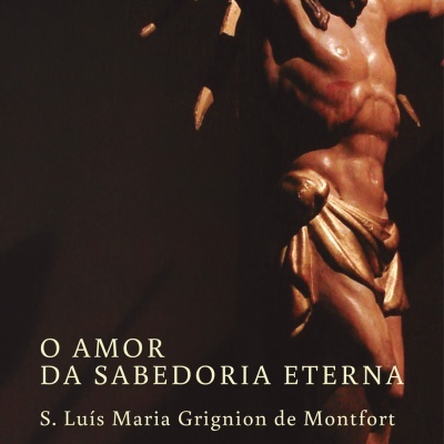 Livro com escultura de Jesus crucificado em madeira dourada e castanha.