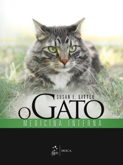 Livro sobre gato cinzento malhado com olhos verdes na relva