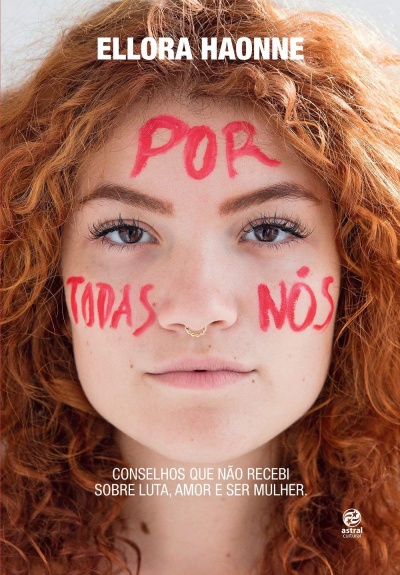 Capa de livro com rosto de mulher ruiva e texto pintado na cara