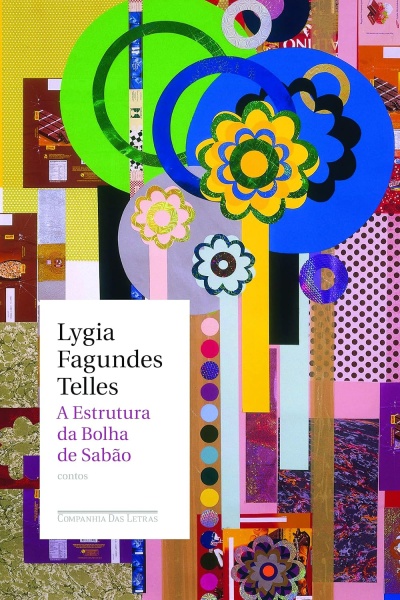 Capa colorida de livro com flores e círculos abstratos, texto do título e autor.