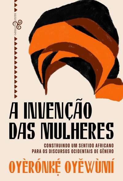 Capa de livro com título, autor e ilustração de turbante em laranja, castanho e preto