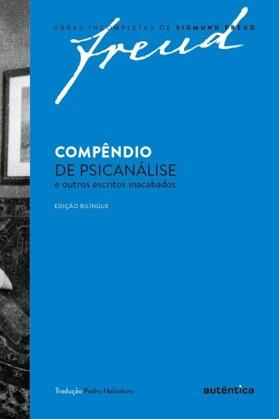 Capa azul de livro de psicanálise de Sigmund Freud com título e texto em português