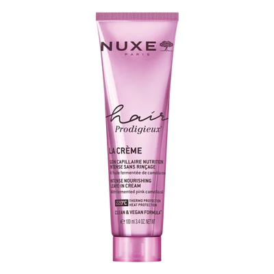 Nuxe Hair Prodigieux Creme 100ml Tubo rosa metálico de creme capilar NUXE Hair Prodigieux com texto preto