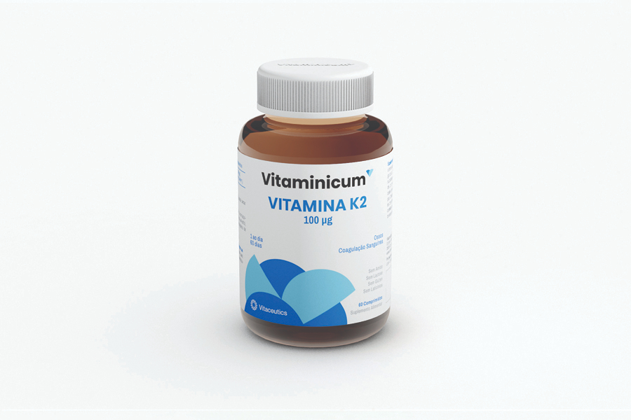 Vitaminicum Vitamina K2 60 Comprimidos Frasco de suplemento Vitamincum Vitamina K2 100 µg com rótulo branco e azul